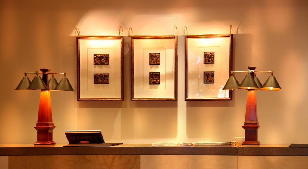 Hotel Royal Hsinchu Interno foto A display of framed stamps